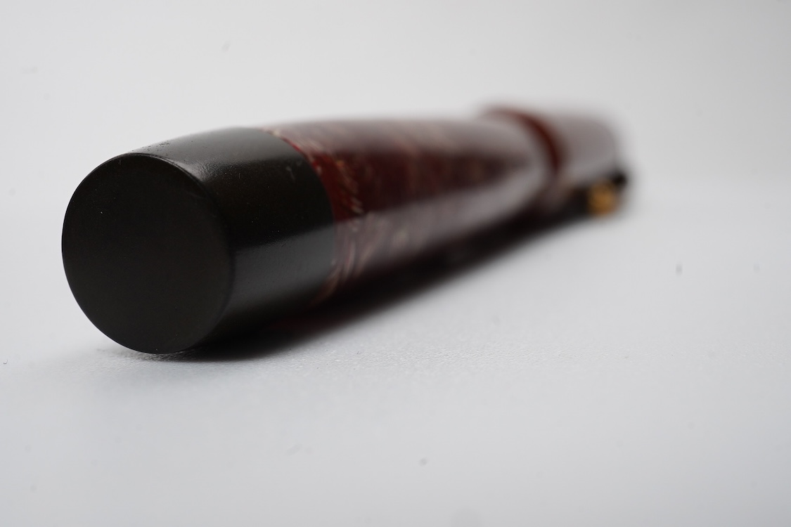 A Parker Senior UK Duofold 'red candy stripe' fountain pen with 14ct. gold 'N' nib